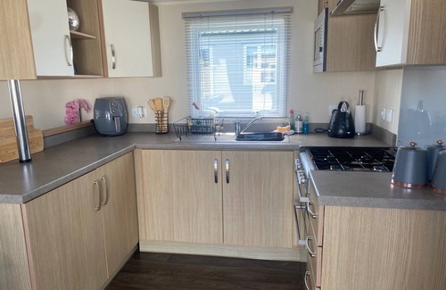 Prestatyn Cabin | Seaside 2-Bed Caravan Retreat - Sleeps 6 & Parking