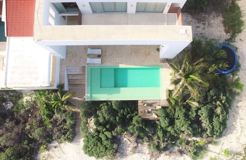 Chicxulub Puerto Apartment | Seaside Villa - Padel & Glamping by LAHOS