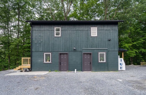 Great Cacapon RV Rental | Secluded Canvas Tent Nestled in the Trees