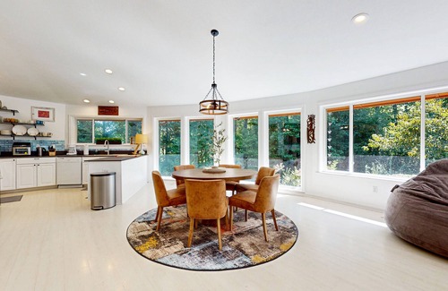 Whittier House | Secluded home with firepit, deck and open windows to nature