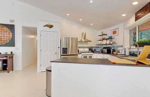Whittier House | Secluded home with firepit, deck and open windows to nature