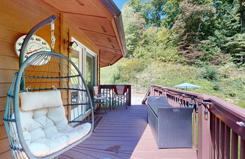 Whittier House | Secluded home with firepit, deck and open windows to nature