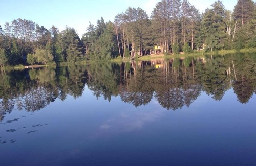 Gwinn Cabin | Secluded lake cabin on 2 acres with swimming beach, dock & sauna, new roof