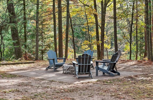 Evart Cabin | Secluded Riverfront Cottage | Sauna, Fire & Kayaks
