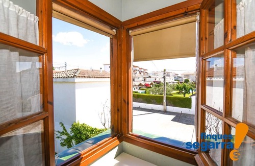 Comarruga House | Semi-detached house with barbecue and communal area with swimming pool, 500m from the beach.