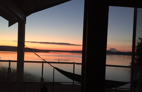 Olympia House | Serene Puget Sound waterfront home with beach access and Mt Rainer view.