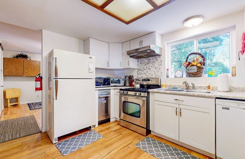 Shingletown House | Serene retreat w/2 kitchens, 2 living rooms, huge deck+ hot tub-creekfront view