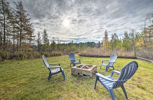 Rapid City House | Serene Riverfront Home w/Torch Lake Access!