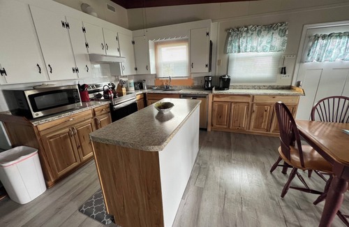 Long Beach House | Short term rentals welcome. Steps to the beach. Pet friendly, fenced yard.