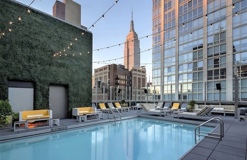 Rose Hill Hotel | Sights and Sounds of NYC Await! Pet-friendly, Rooftop Pool, Onsite Dining!