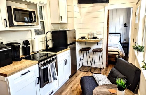 Ashley Oaks House | Simple meets modern in this farmhouse style tiny home!