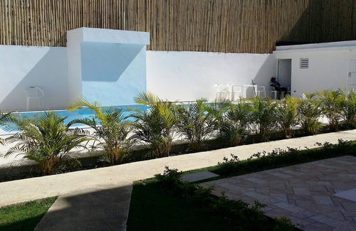 El Batey Apartment | Single room in central Sosua, top floor, guest-friendly near clubs/beach
