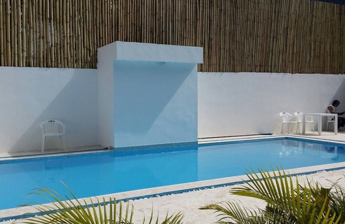 El Batey Apartment | Single room in central Sosua, top floor, guest-friendly near clubs/beach