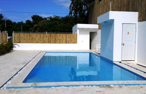 El Batey Apartment | Single room in central Sosua, top floor, guest-friendly near clubs/beach