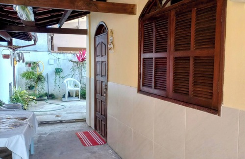 Rio das Ostras House | Single-story linear house with swimming pool in Atlântico.