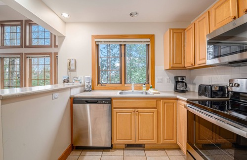 Boyne Falls Hotel | Ski-in/out condo near lifts with ski views, pool, tennis, hot tub, skiing, AC