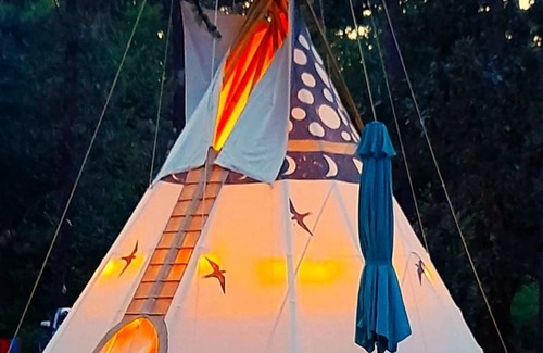 Cave Junction Apartment | Sky Spirit -Luxury Glamping 18' Tipi - Restrooms and Showers are only a short walk away.