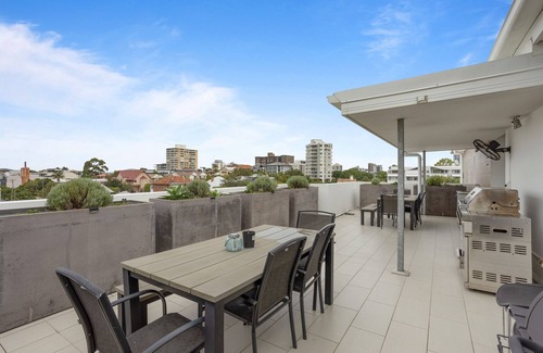 New Farm Apartment | Sleek 2-Bed with Balcony and Communal BBQ Area