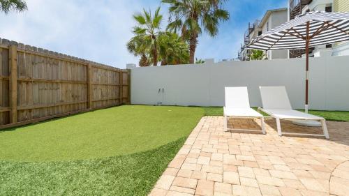 Frangista Beach House | Sleeps 20, Private Pool, Putting Green, Walk to Beach Vitamin Sea by AvantStay