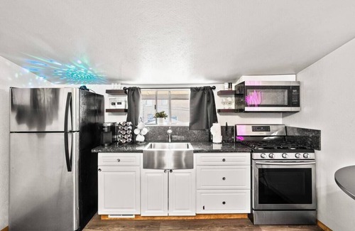 Sunnyside House | Sleeps 30! Denver Rally House w/Game Rooms, Hot Tub, Private Chef & 420 Shuttle