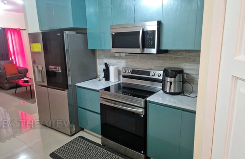 Portmore Apartment | Smart Beachfront Condo with Pool & Ocean Views