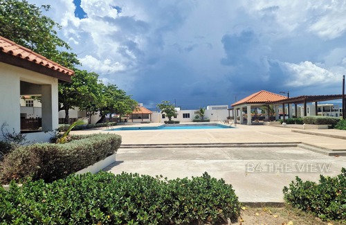 Portmore Apartment | Smart Beachfront Condo with Pool & Ocean Views