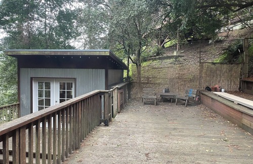 Forestland Cabin | Soothing modern Oakland Hills treehouse with deck
