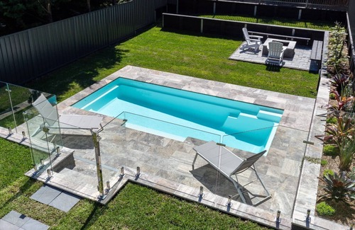 Culburra Beach House | Sounds by the Sea – Inground swimming pool, fire pit, games area