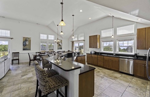Wind Over Waves House | Soundside Dog Friendly w/Pool, Elevator, Hot Tub, Game and Theater Rooms