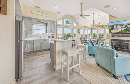 Wind Over Waves House | Soundside Dog Friendly Home w/Pool, Hot Tub, Game Room, Tiki Bar, Public Dock