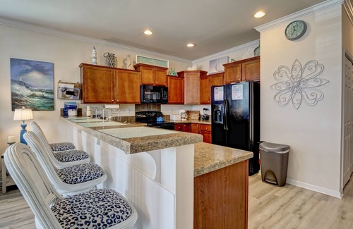 Wilmington Beach House | Southern Belle Enjoy the southern winds and spectacular views from the porch
