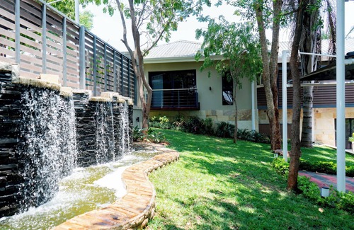 Goromonzi Villa | Spacious 4-bedroom apartment with WiFi, fitness room in enjoyable Harare