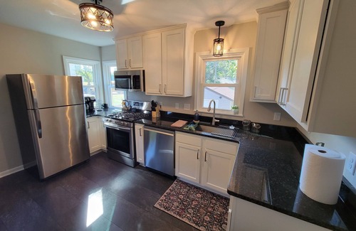 Edina House | Spacious 5-bedroom house in terrific Hopkins with open living and dining space.