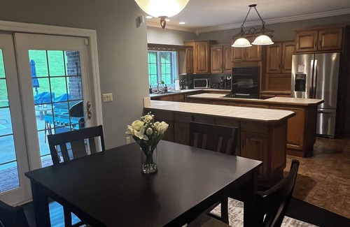 Dayhoit House | Spacious 5-bedroom house in historic Harlan! In-ground Pool/Hot Tub/Game Room