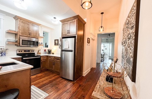 Excelsior Springs Condo | Spacious and Airy Loft/2 king beds/5 bed total/Overlooking Broadway Ave