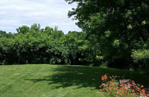 Green Bay House | Spacious "Bayview" 4-bedroom home in serene setting. Minutes to Lambeau Field.