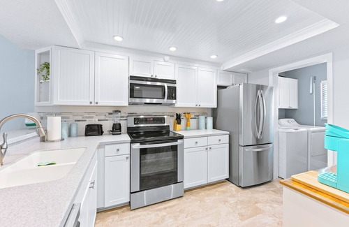Port Canaveral Condo | Spacious & Beachy Monthly Rental - On Beach w/Pool!