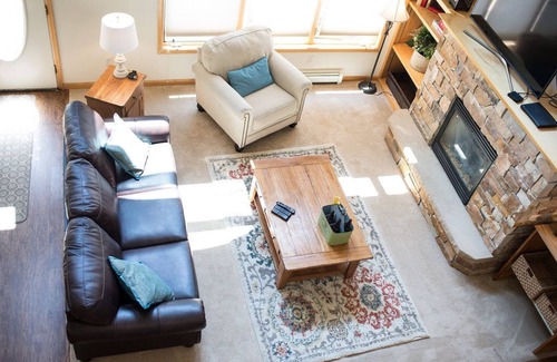 Stanley Hills Condo | Spacious, bright condo w/outdoor hot tub, and amazing views of Estes Valley!