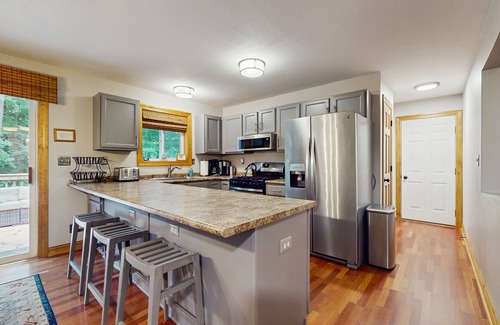 Shorewood-Tower Hills-Harbert House | Spacious Dog Friendly Home w/heated pool, fenced yard, gas grill, & fire pit