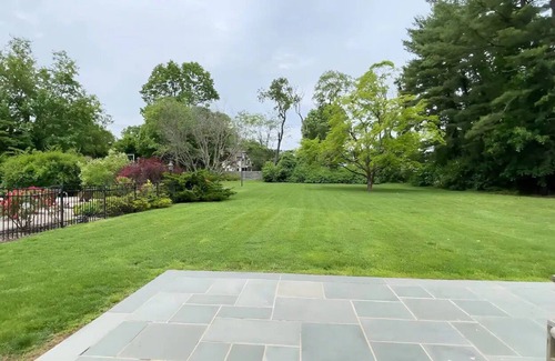 Glen Head House | Spacious Hampton style house with giant indoor basketball court.