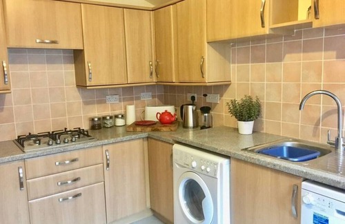 Sheringham Apartment | Spacious home, moments from beach/shops. Private parking, garden. Pet friendly.