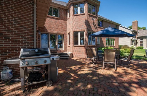 Oshkosh House | Spacious Home on the Water with Indoor Pool and Room For Everyone!