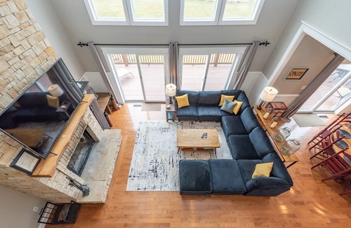Waterfront Greens House | Spacious Lake Retreat w/Hot Tub & Fireplace