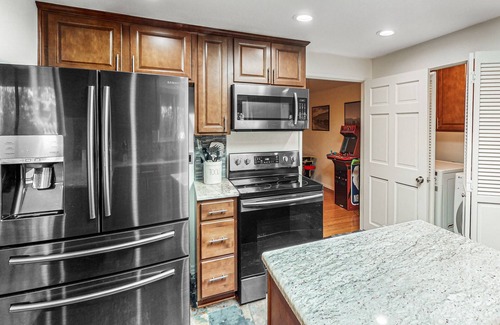 Old Farm District House | Spacious retreat with private hot tub, dog-friendly, arcade