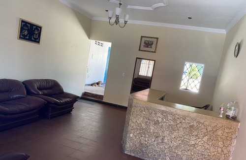 Sur Oriente House | Spacious room with air conditioning and private bathroom