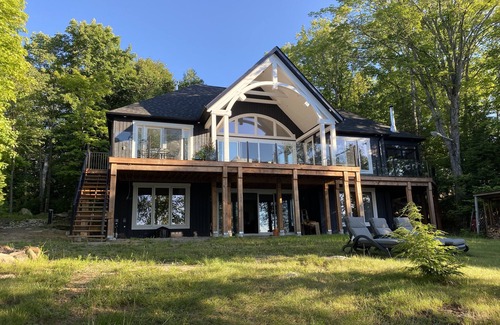 Dysart et al Cottage | Spectacular new 4 season cottage on pristine Kennisis Lake! Sauna and hot tub!