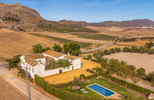 Teba House | Spend a relaxing vacation in this idyllically located vacation home with pool access.