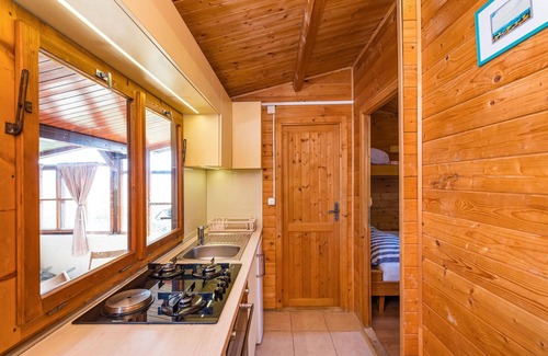 Mali Iz House | Spend your vacation in this cute little house near the beach.