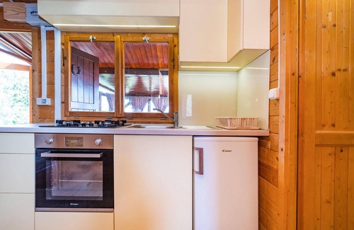 Mali Iz House | Spend your vacation in this cute little house near the beach.