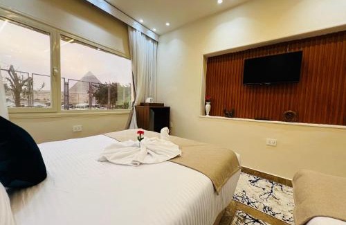 Giza Hotel | Sphinx Scarab Pyramids View